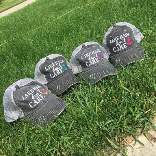 Beach hats and tanks Embroidered distressed trucker caps.