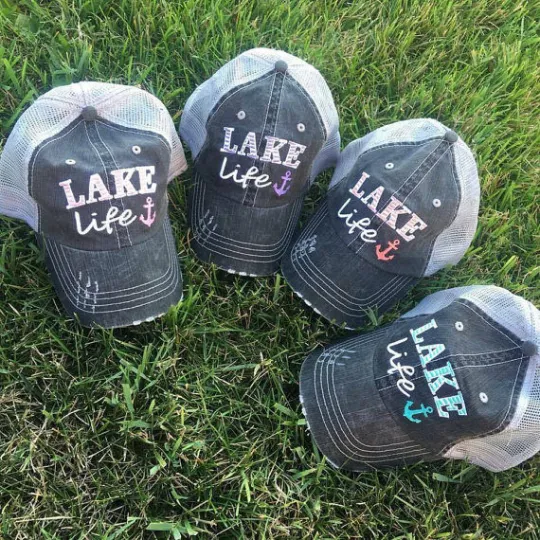 Beach hats and tanks Embroidered distressed trucker caps.