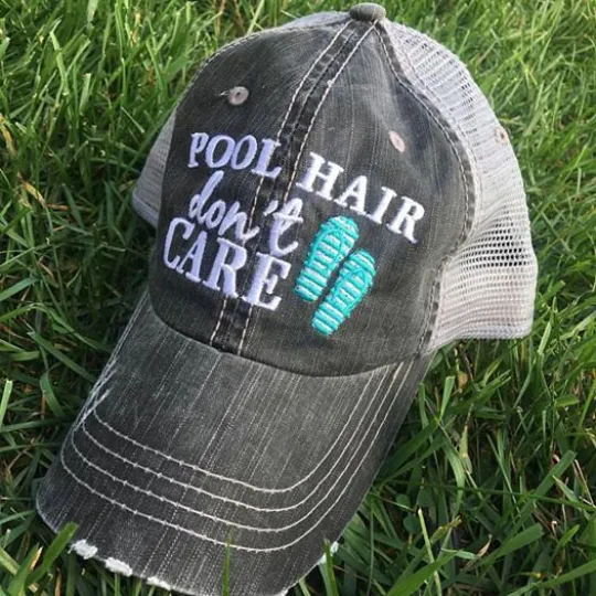 Beach hats and tanks Embroidered distressed trucker caps.