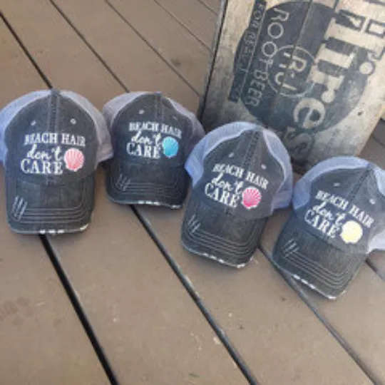 Beach hats and tanks Embroidered distressed trucker caps.